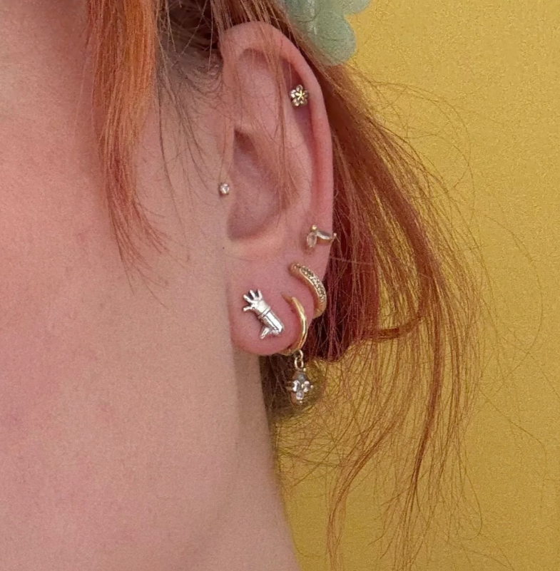 Feathers McGraw Stud Earrings (Sterling Silver)